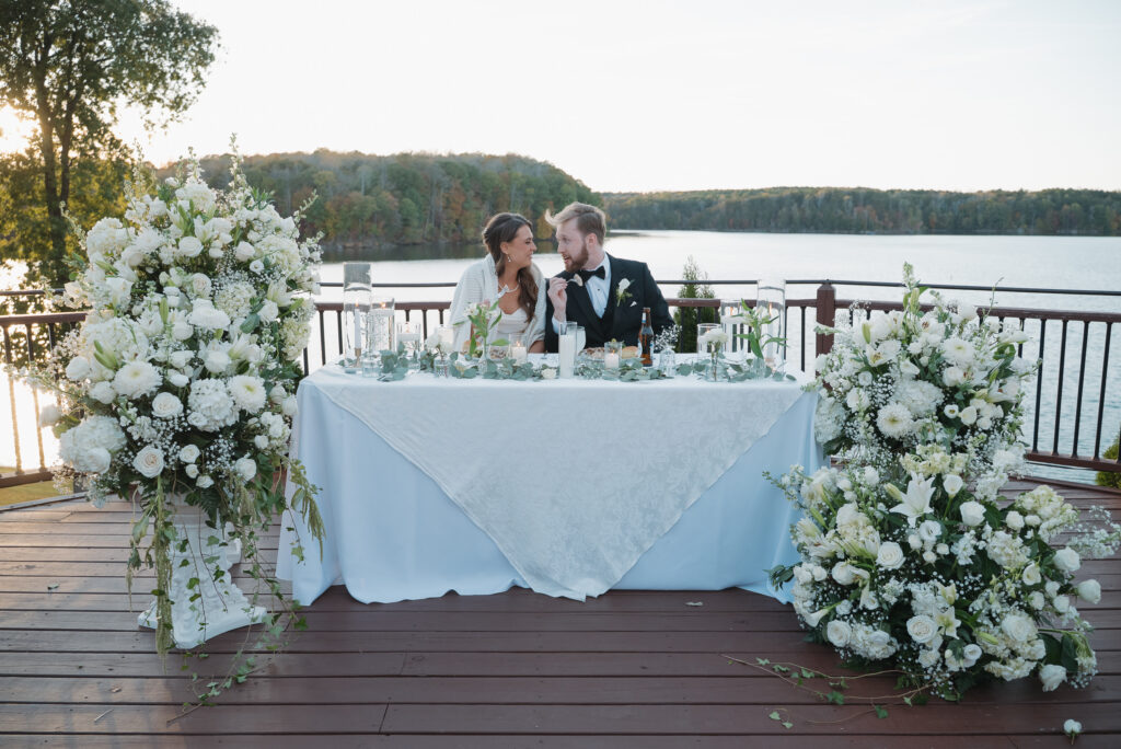 Bride and Groom on Patio of Bella Collina 